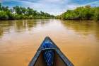 USA, New Mexico, Rio Grande River. Bow of canoe on river. Art Print